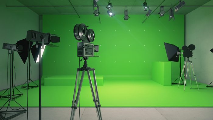 Modern Empty Green Photo Studio With Old Style Movie Camera